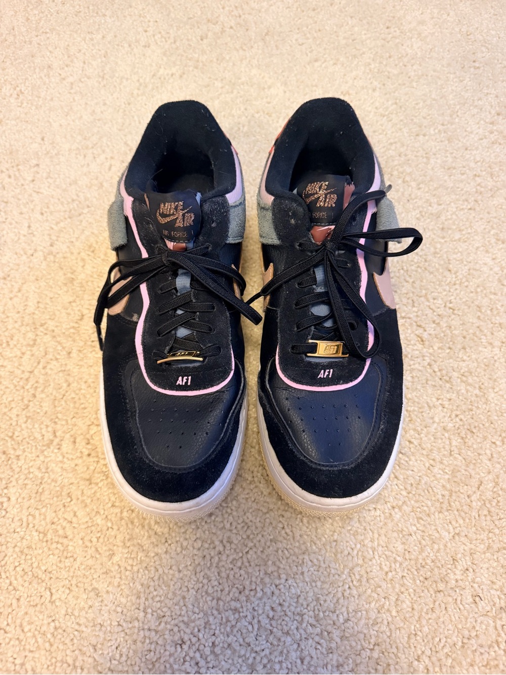 Nike Women's AF1 Low Sneakers in Black and Pink Accent